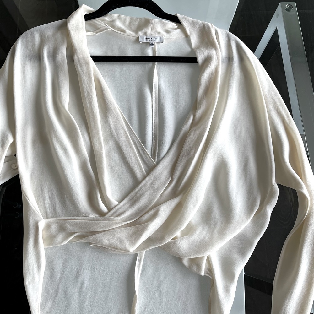 Gorgeous white babaton going out top.